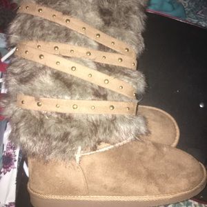 Tall fur boots